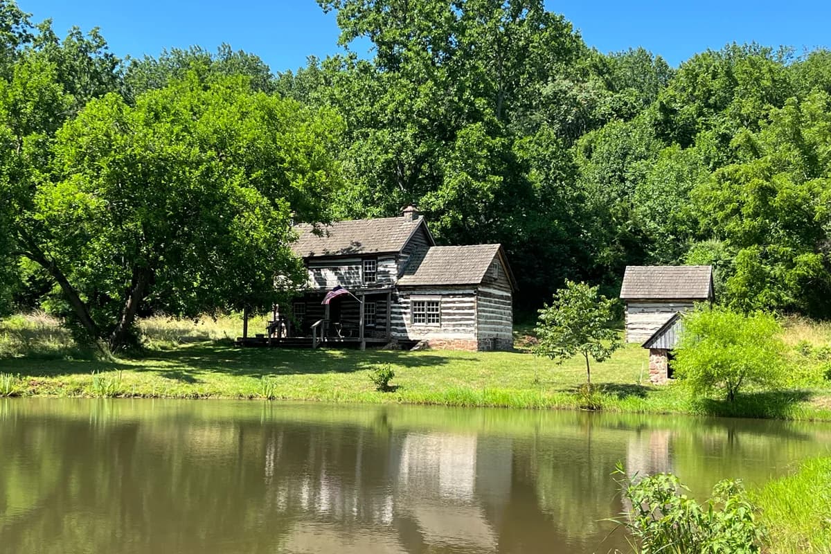 The historic log cabin beside the Small Pond